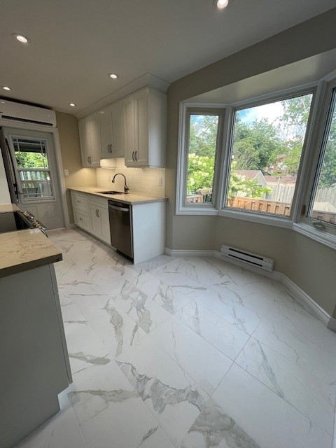 Laurie Losier Finished renovation of their large kitchen with bay window